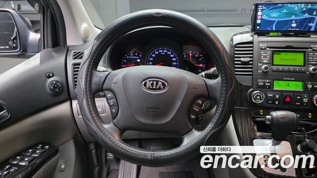 Kia Canival NewCarnival Limousine GLX High-Deluxe 2014 — фото 1