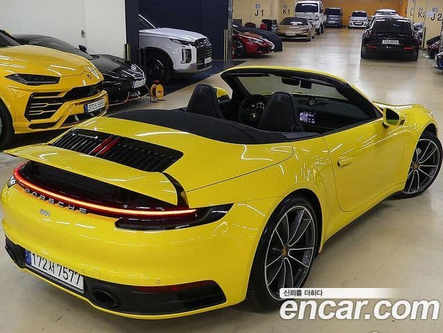 Porsche 911 Carrera Cabriolet 2021 — фото 1