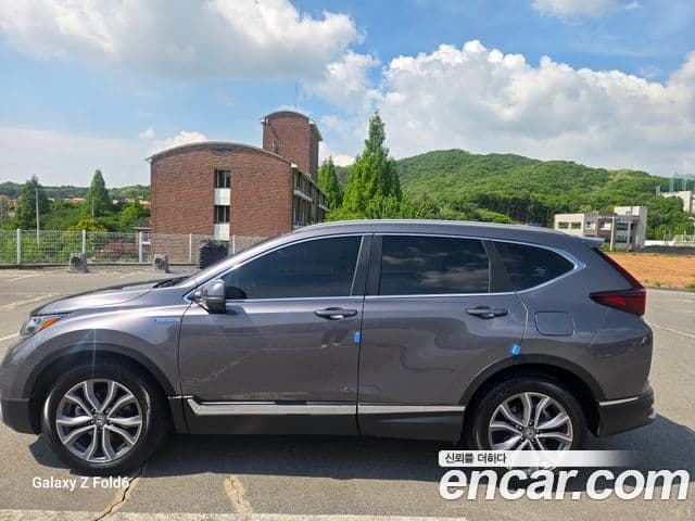 Honda CR-V 2.0 Hybrid Touring 4 WD 2021 — фото 1